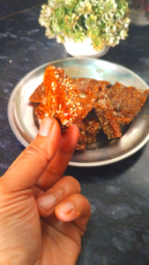 Crispy til gur chikki pieces ready to serve