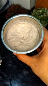 Grinding soaked dry fruits into smooth paste for Ramzan Sehri energy drink