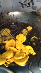 kadhi pakora pakodi frying in oil besan fritters deep frying