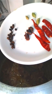 Adding whole spices to keema stew