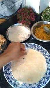 Rolling chana dal stuffed paratha