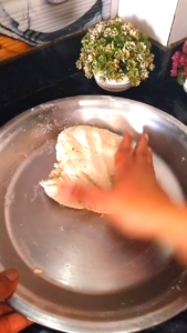 Kneading dough with water and resting it with oil for namak para recipe