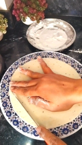Cutting dough into diamond shape for namak para recipe