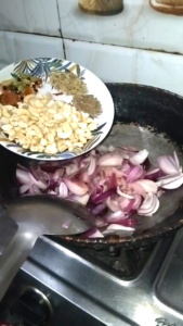 Cashews, Cumin, Fennel, Mace, Green Cardamom and Black Pepper Added to Onions