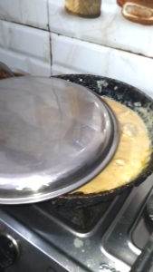 White Chicken Cooking on Low Flame with Lid Covered