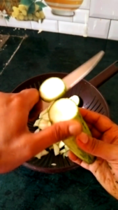 Cutting Fresh Ridge Gourd (Nenua) for Home Style Recipe