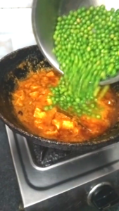 Green Peas Added to Paneer Gravy and Cooked Until Tender
