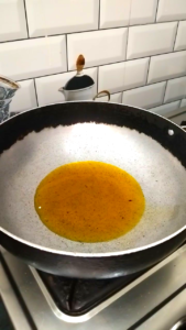 Heating Mustard Oil in a Pan for Bhindi Recipe