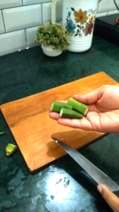 Cutting Fresh Bhindi for Dahi Bhindi Recipe