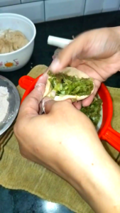 Filling Keema Stuffing in Dough